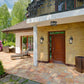 Z-Lite Roundhouse 8" 1-Light Black Outdoor Wall Sconce With Clear Seedy Glass Shade