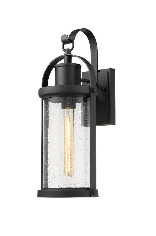 Z-Lite Roundhouse 8" 1-Light Black Outdoor Wall Sconce With Clear Seedy Glass Shade