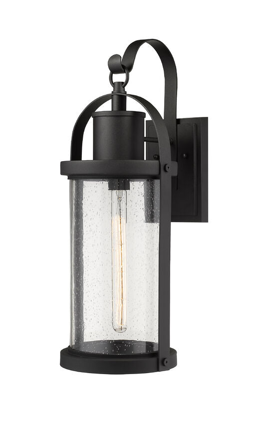Z-Lite Roundhouse 9" 1-Light Black Outdoor Wall Sconce With Clear Seedy Glass Shade