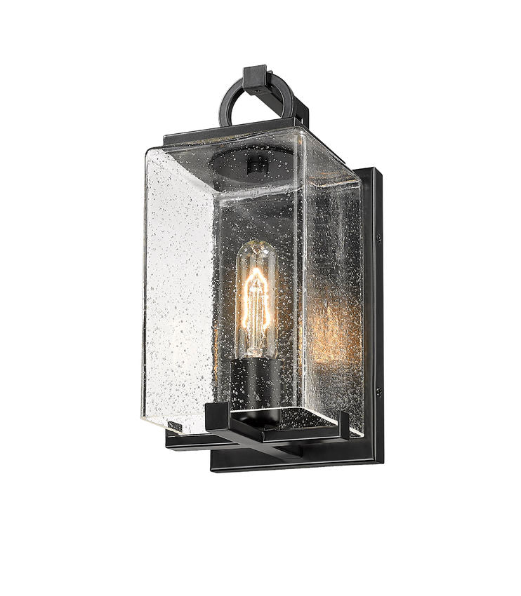 Z-Lite Sana 6" 1-Light Black Aluminum Outdoor Wall Sconce With Seedy Glass Shade