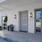 Z-Lite Sana 6" 1-Light Black Aluminum Outdoor Wall Sconce With Seedy Glass Shade