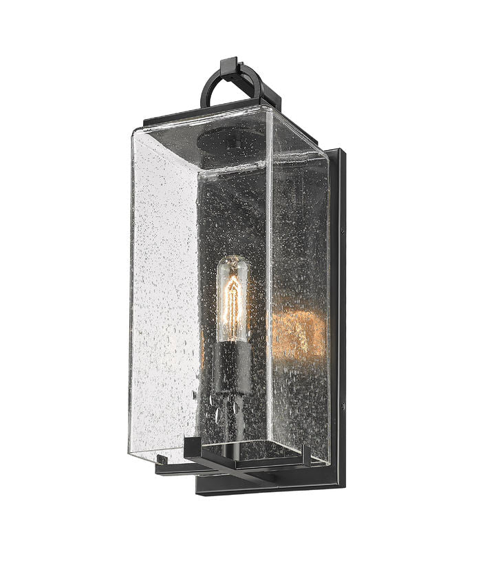 Z-Lite Sana 7" 1-Light Black Aluminum Outdoor Wall Sconce With Seedy Glass Shade