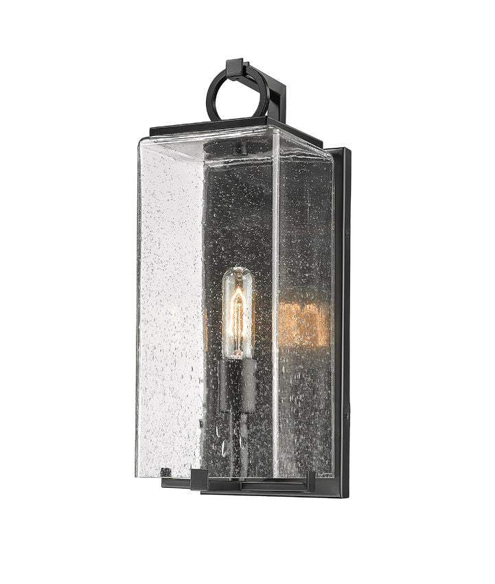 Z-Lite Sana 7" 1-Light Black Aluminum Outdoor Wall Sconce With Seedy Glass Shade