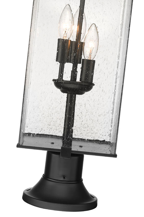 Z-Lite Sana 9" W x 29" H 3-Light Black Outdoor Pier Mounted Fixture and Round Pier Mount Hardware With Seedy Glass Shade