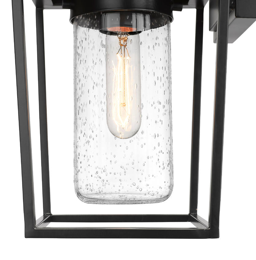 Z-Lite Sheridan 7" 1-Light Black Aluminum Outdoor Wall Sconce With Seedy Glass Shade