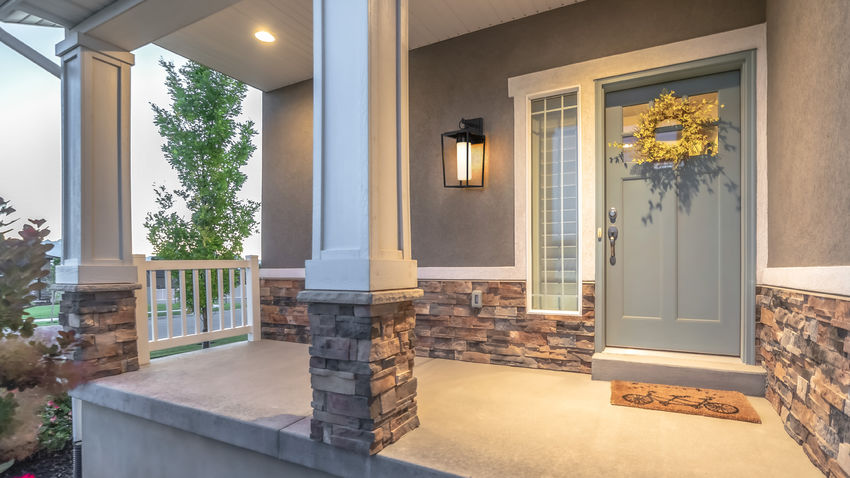 Z-Lite Sheridan 8" 1-Light Black Aluminum Outdoor Wall Sconce With White Opal Glass Shade