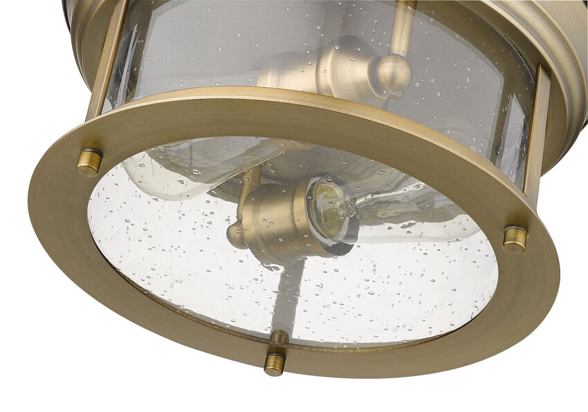 Z-Lite Sonna 11" 2-Light Heritage Brass Flush Mount Lighting With Clear Seedy Glass Shade