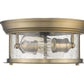 Z-Lite Sonna 11" 2-Light Heritage Brass Flush Mount Lighting With Clear Seedy Glass Shade