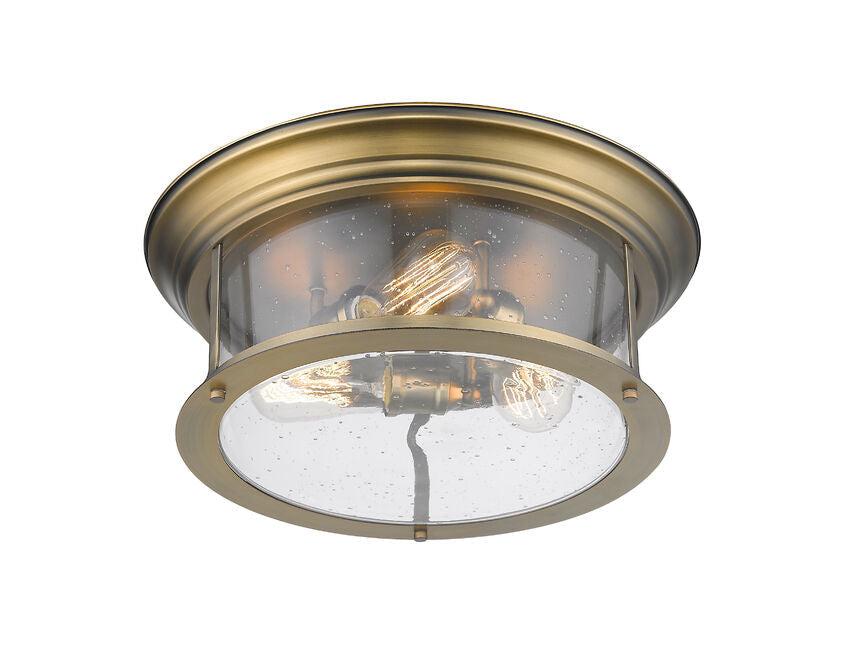 Z-Lite Sonna 16" 3-Light Heritage Brass Flush Mount Lighting With Clear Seedy Glass Shade