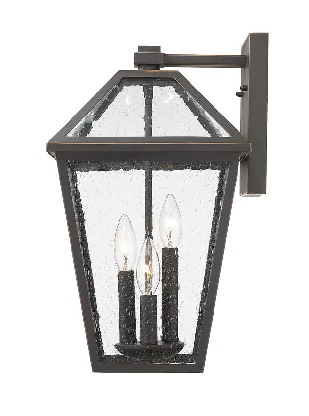 Z-Lite Talbot 10" 3-Light Oil Rubbed Bronze Stainless Steel Outdoor Wall Sconce With Seedy Glass Shade