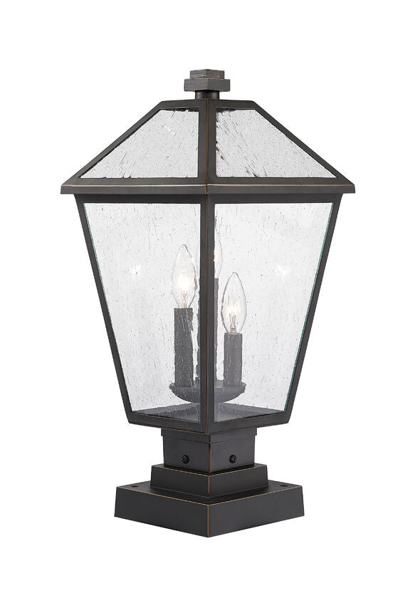 Z-Lite Talbot 10" W x 21" H 3-Light Oil Rubbed Bronze Outdoor Pier Mounted Fixture and Square Pier Mount Hardware With Seedy Glass Shade