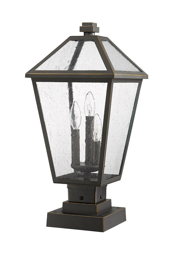 Z-Lite Talbot 10" W x 21" H 3-Light Oil Rubbed Bronze Outdoor Pier Mounted Fixture and Square Pier Mount Hardware With Seedy Glass Shade