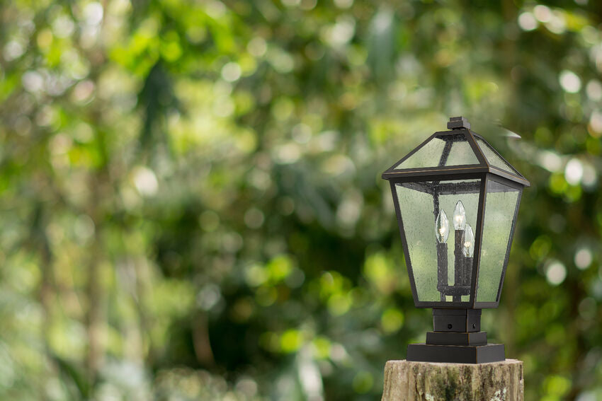 Z-Lite Talbot 10" W x 21" H 3-Light Oil Rubbed Bronze Outdoor Pier Mounted Fixture and Square Pier Mount Hardware With Seedy Glass Shade
