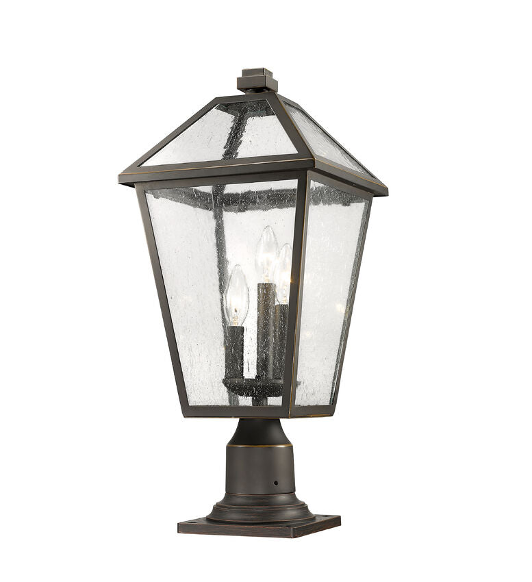 Z-Lite Talbot 10" W x 22" H 3-Light Oil Rubbed Bronze Outdoor Pier Mounted Fixture and Square Pier Mount Hardware With Seedy Glass Shade