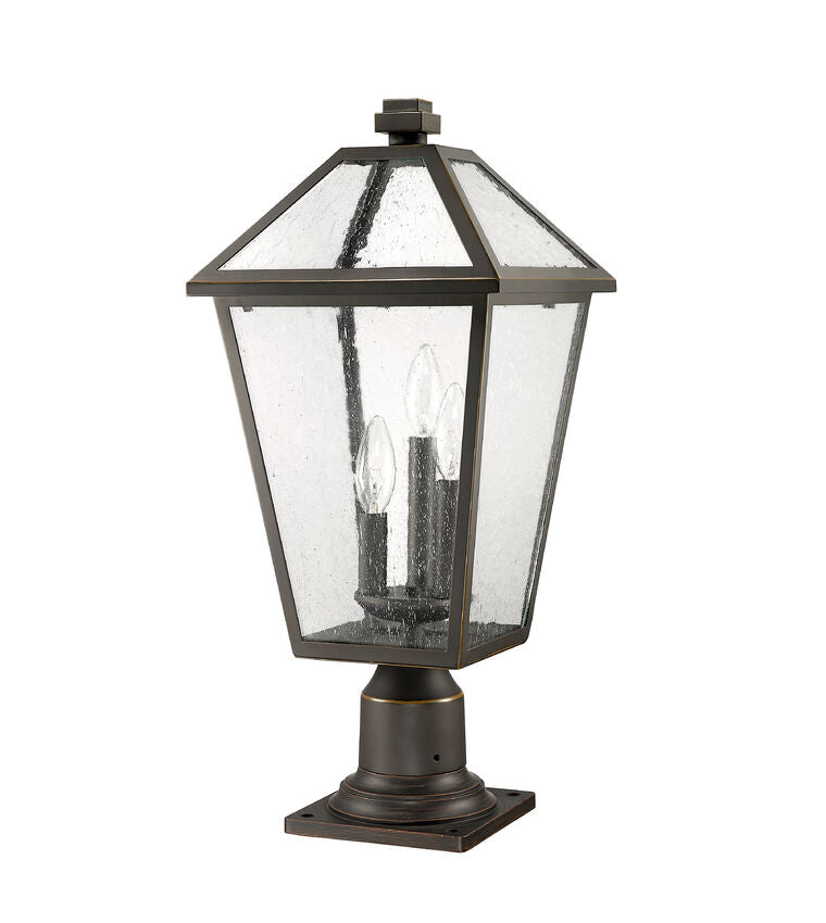Z-Lite Talbot 10" W x 22" H 3-Light Oil Rubbed Bronze Outdoor Pier Mounted Fixture and Square Pier Mount Hardware With Seedy Glass Shade