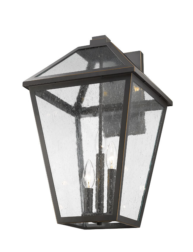 Z-Lite Talbot 12" 3-Light Oil Rubbed Bronze Stainless Steel Outdoor Wall Sconce With Seedy Glass Shade