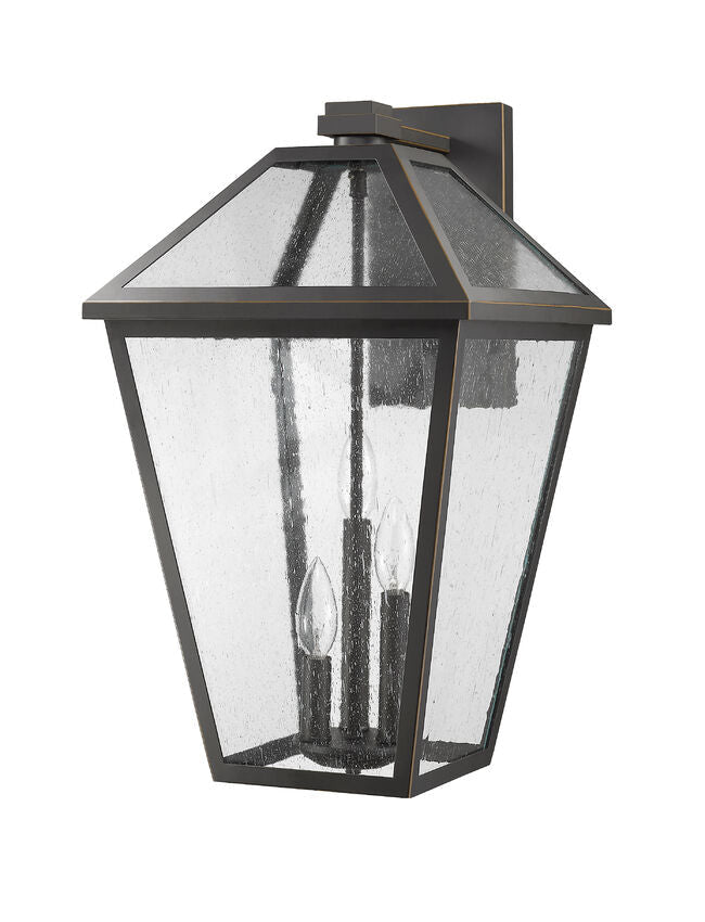 Z-Lite Talbot 12" 3-Light Oil Rubbed Bronze Stainless Steel Outdoor Wall Sconce With Seedy Glass Shade