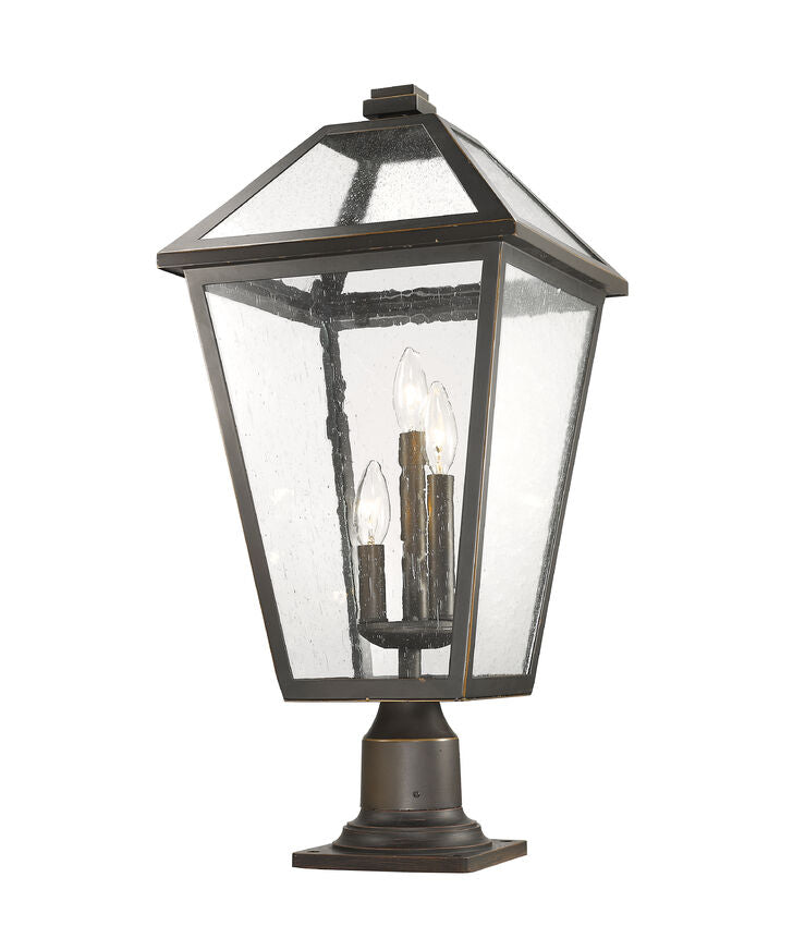 Z-Lite Talbot 12" W x 26" H 3-Light Oil Rubbed Bronze Outdoor Pier Mounted Fixture and Square Pier Mount Hardware With Seedy Glass Shade