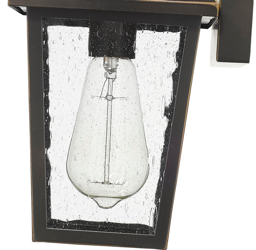 Z-Lite Talbot 7" 1-Light Oil Rubbed Bronze Stainless Steel Outdoor Wall Sconce With Seedy Glass Shade