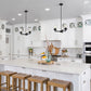 Z-Lite Thayer 19" 3-Light Matte Black Steel and Clear Glass Shade Pendant Light