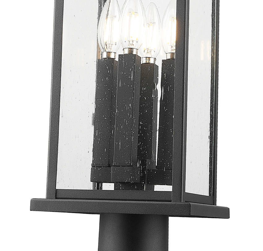 Z-Lite Tiberius 9" 4-Light Candelabra Base Black Aluminum Clear Seedy Glass Shade Outdoor Pier Mounted Fixture