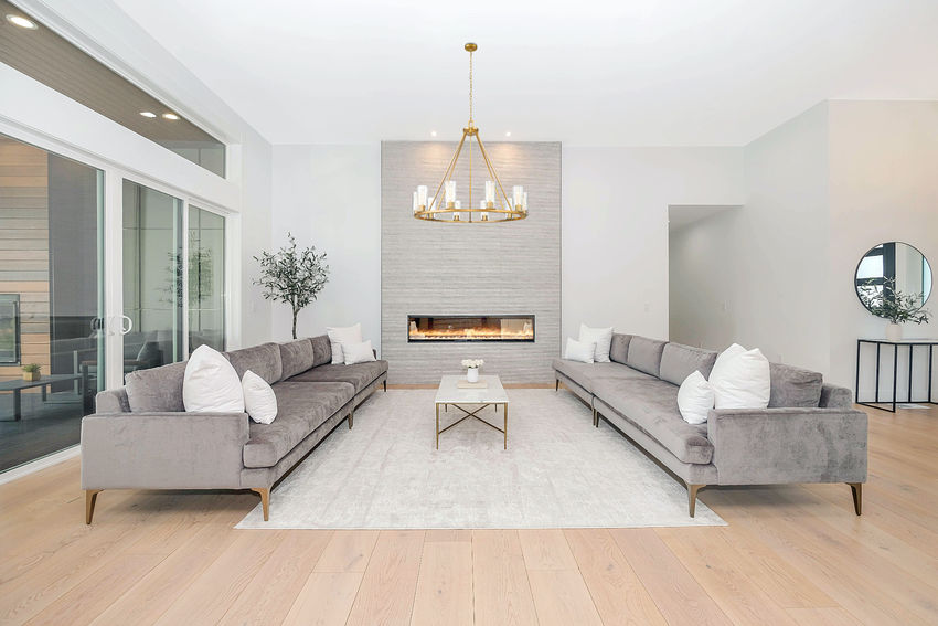 Z-Lite Titus 46" 10-Light Modern Gold Steel Chandelier With Clear Glass Shade
