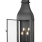 Z-Lite Toulouse 4-Light Candelabra Aluminum and Stainless Steel Sand Black Frame Clear Seedy Glass Shade Outdoor Wall Light