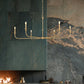 Z-Lite Tova 66" 6-Light Rubbed Brass Steel Frame White Fabric Shade Chandelier