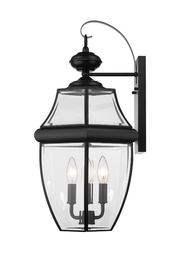 Z-Lite Westover 12" 3-Light Black Brass Outdoor Wall Sconce With Clear Beveled Glass Shade